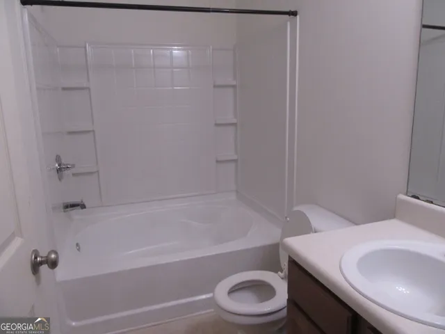 a close view of light fixtures and stove in a room