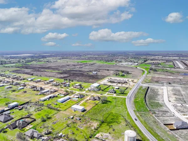 a view of a lake with a city