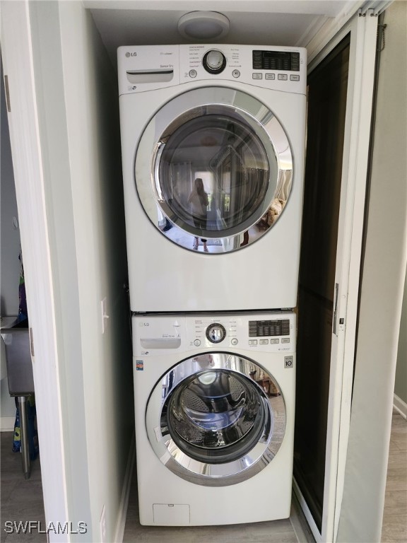 10823 Ani Circle Estero, FL 33928 - Photo 17 of 31 a utility room with dryer and washer
