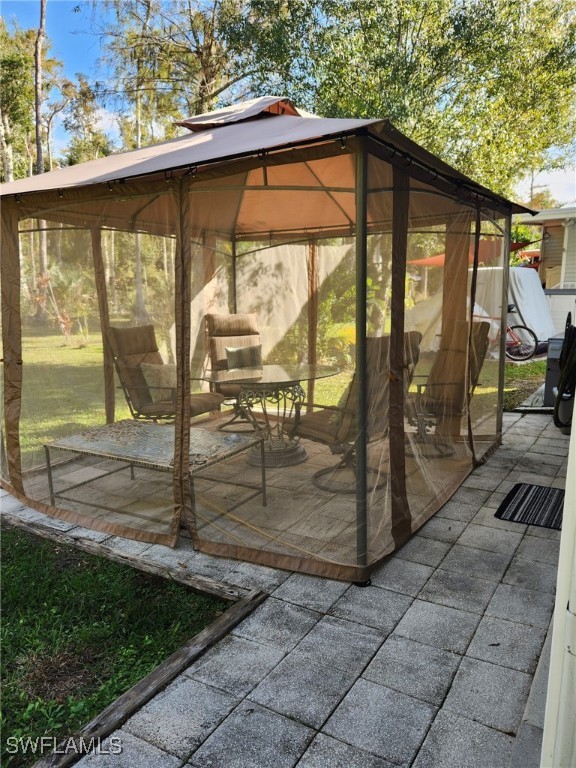 10823 Ani Circle Estero, FL 33928 - Photo 22 of 31 a view of outdoor space with seating