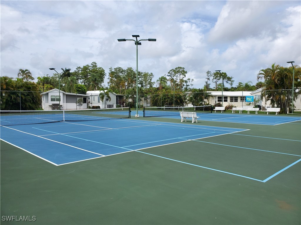 10823 Ani Circle Estero, FL 33928 - Photo 30 of 31 a view of a tennis court