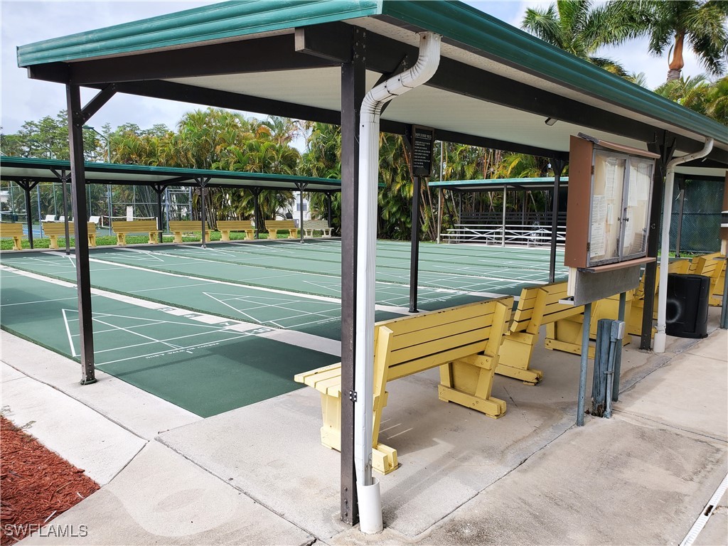 10823 Ani Circle Estero, FL 33928 - Photo 31 of 31 a view of a swimming pool with a patio