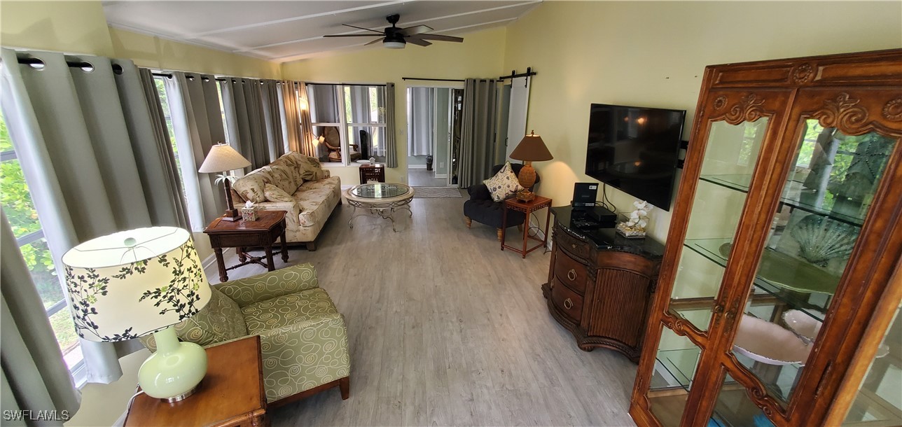 10823 Ani Circle Estero, FL 33928 - Photo 8 of 31 a living room with furniture and a large window