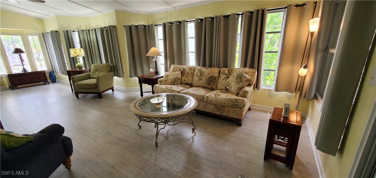 10823 Ani Circle Estero, FL 33928 - Photo 9 of 31 a living room with furniture and a flat screen tv