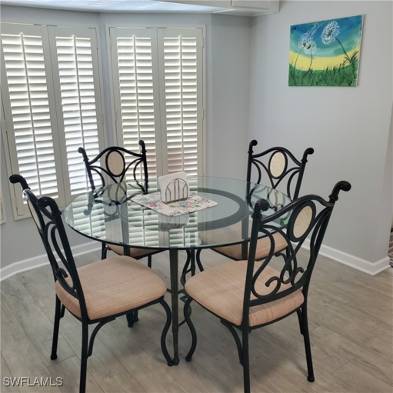 10823 Ani Circle Estero, FL 33928 - Photo 10 of 31 a view of a dining room with furniture window and outside view