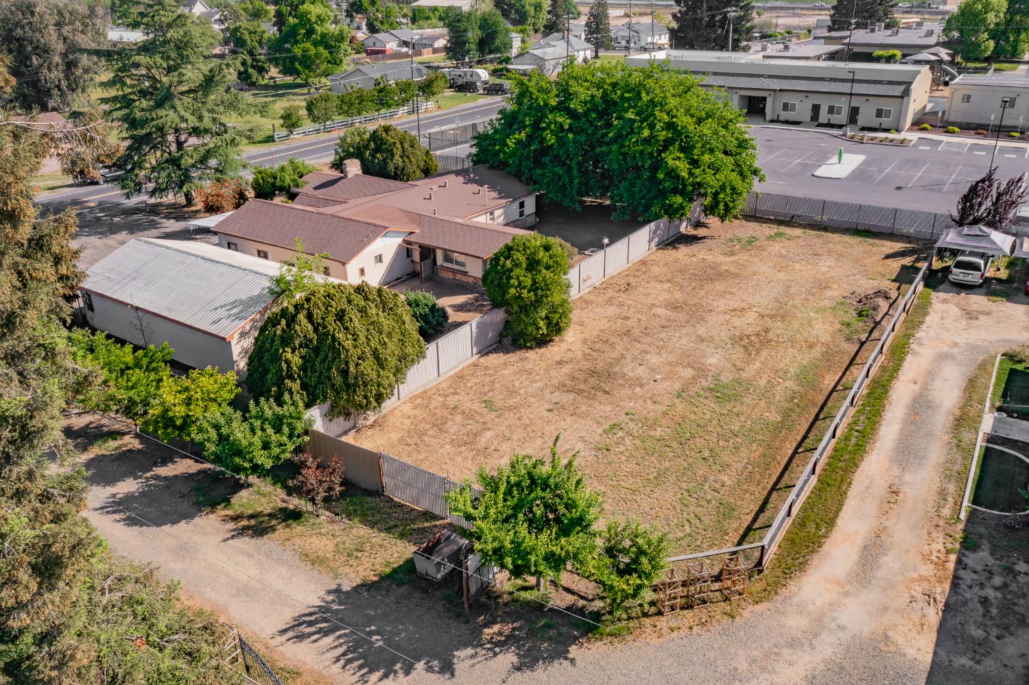 13230 4th Street Hickman, CA 95323 - Photo 13 of 54 an aerial view of a house with a yard