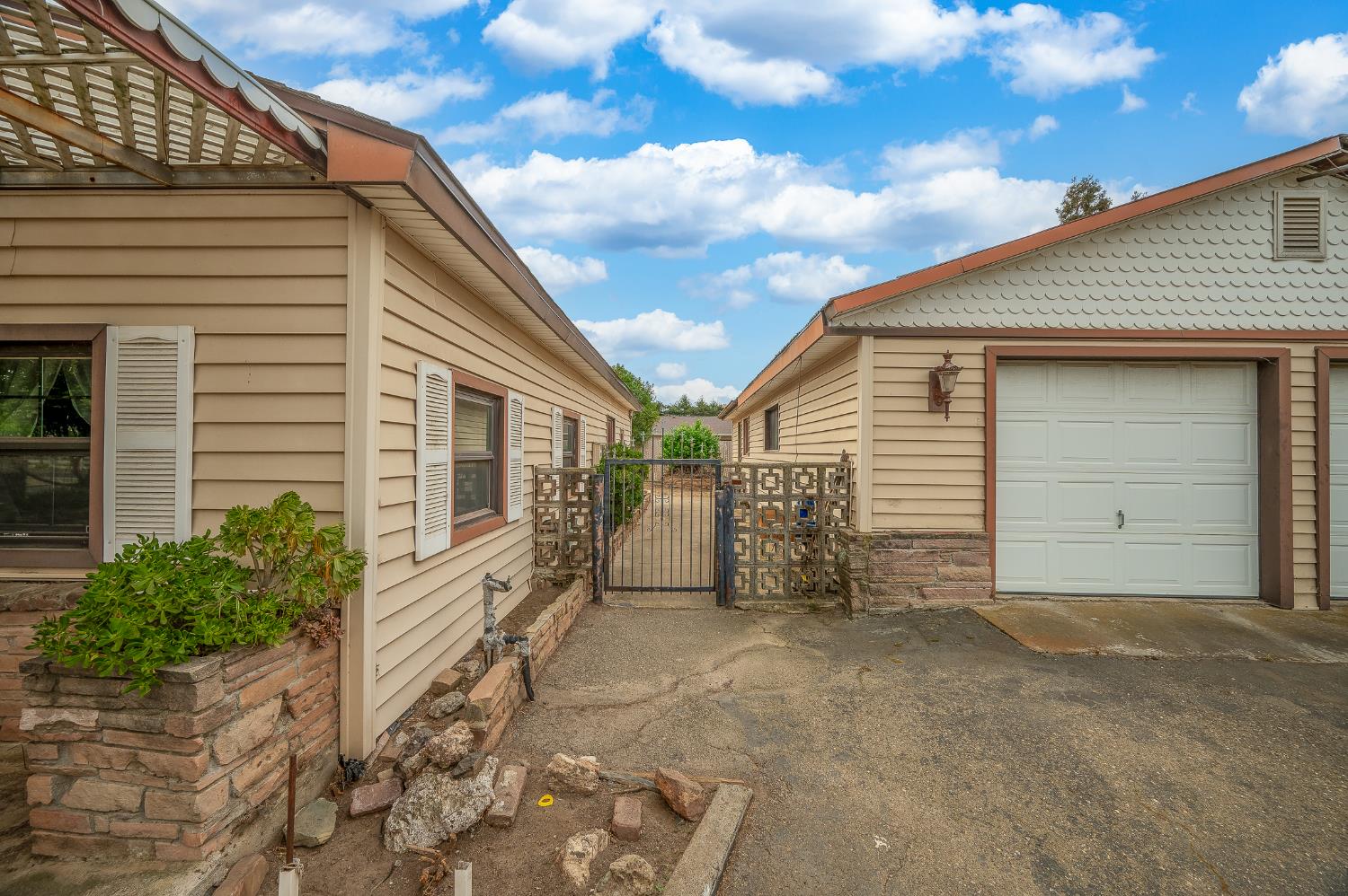 13230 4th Street Hickman, CA 95323 - Photo 17 of 54 a view of a house with backyard
