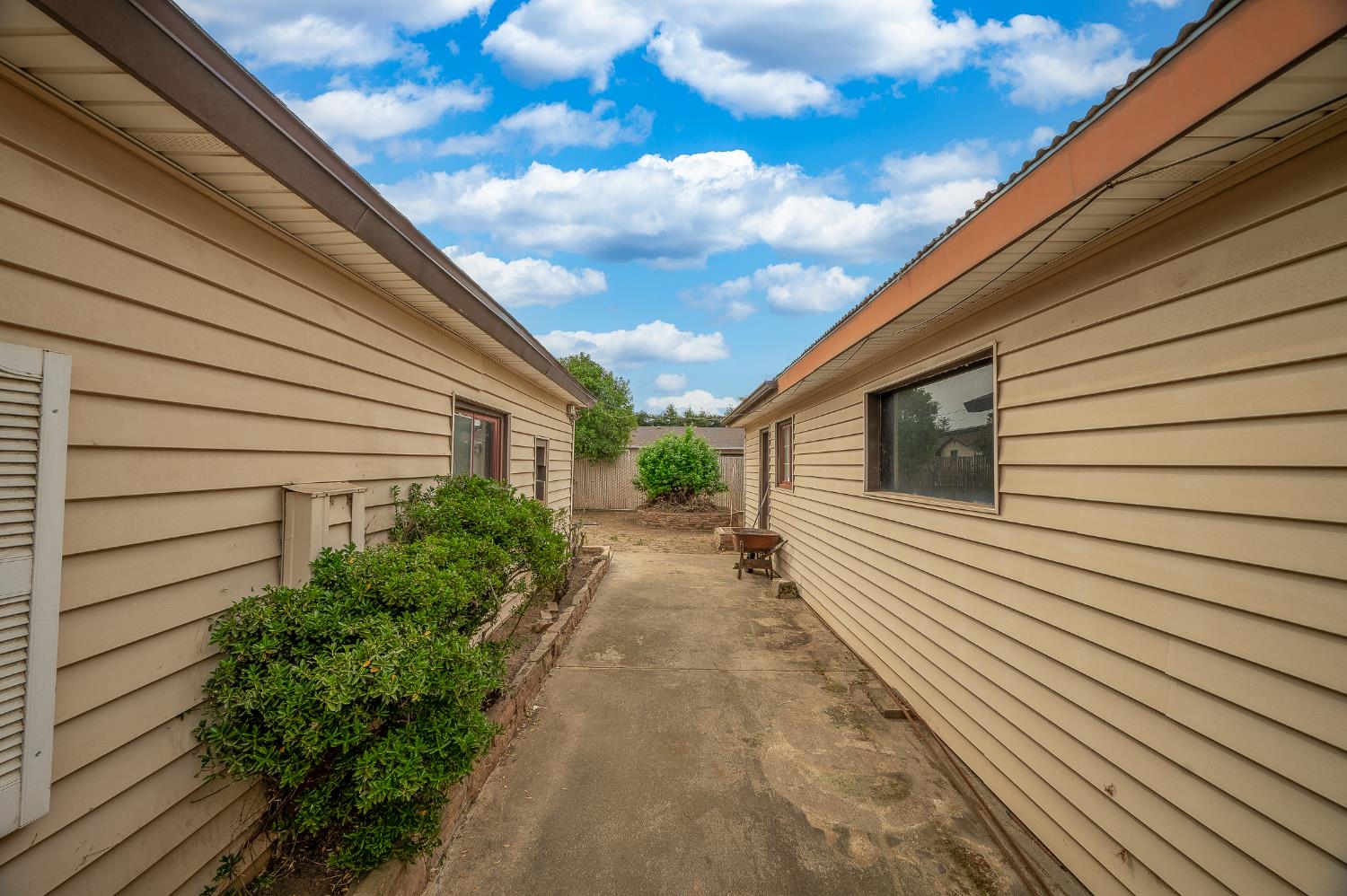 13230 4th Street Hickman, CA 95323 - Photo 18 of 54 a view of a backyard with potted plants