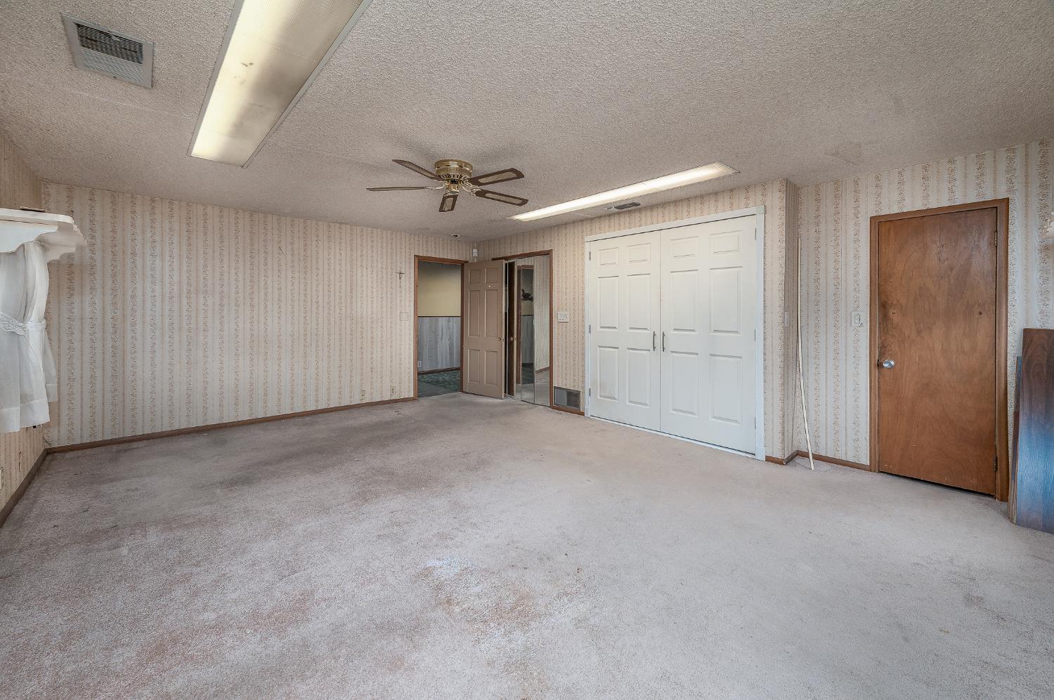 13230 4th Street Hickman, CA 95323 - Photo 44 of 54 a view of an empty room with a window