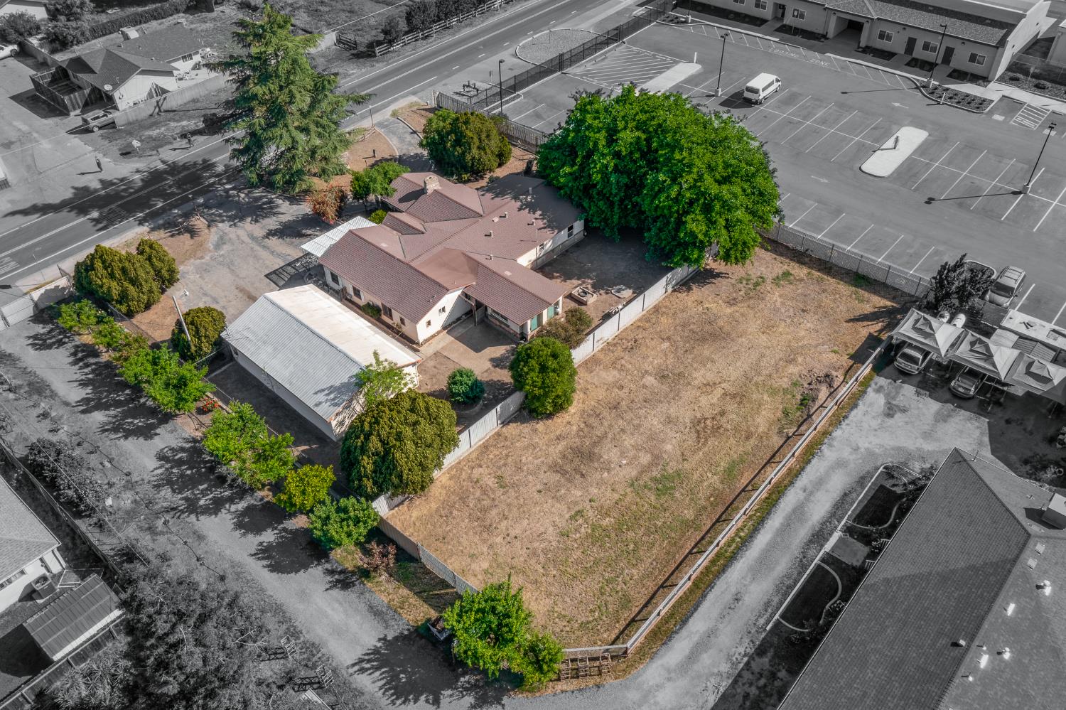 13230 4th Street Hickman, CA 95323 - Photo 7 of 54 an aerial view of a house with a yard and a sitting area