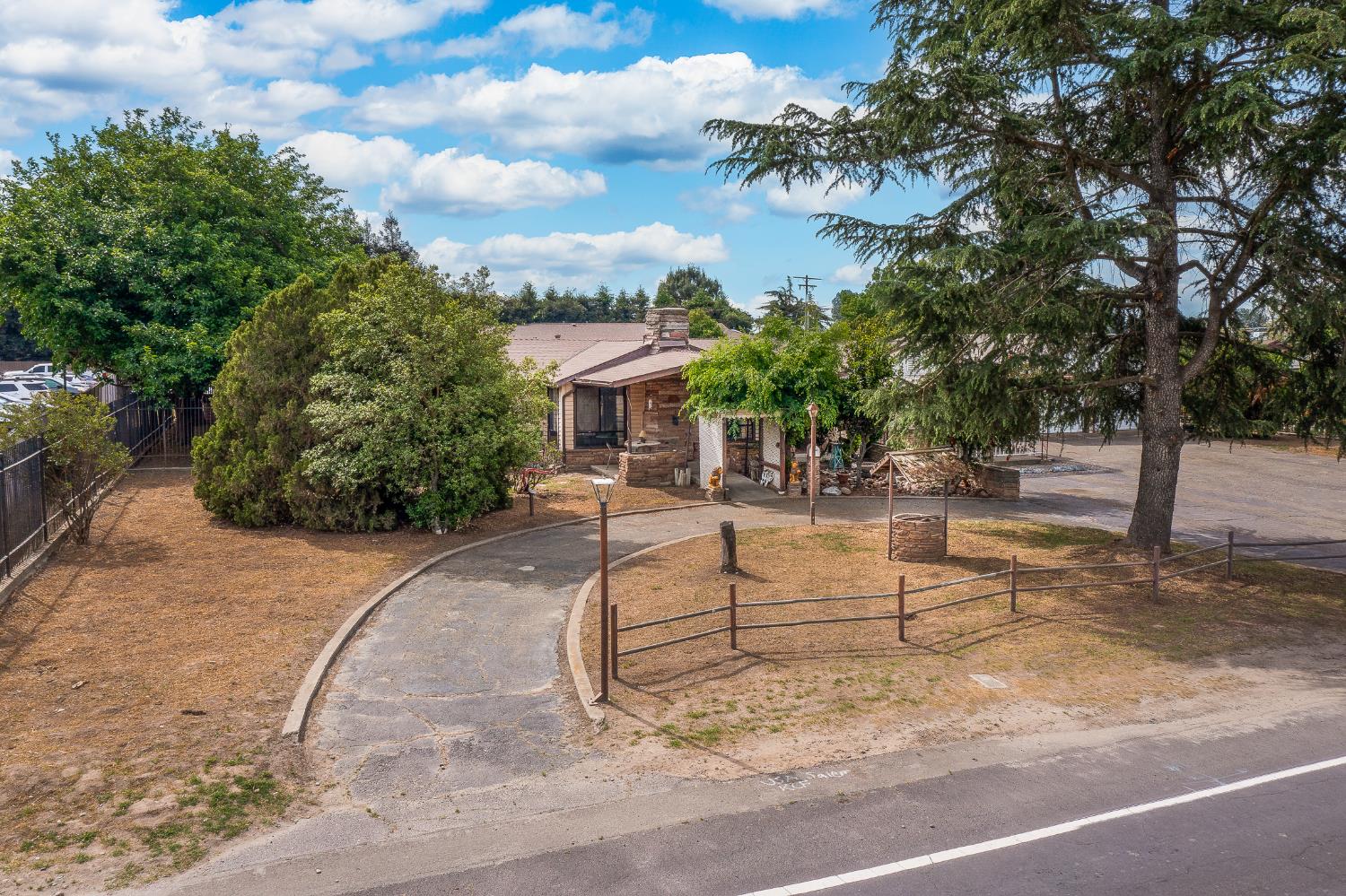 13230 4th Street Hickman, CA 95323 - Photo 9 of 54 a view of a swimming pool with a patio