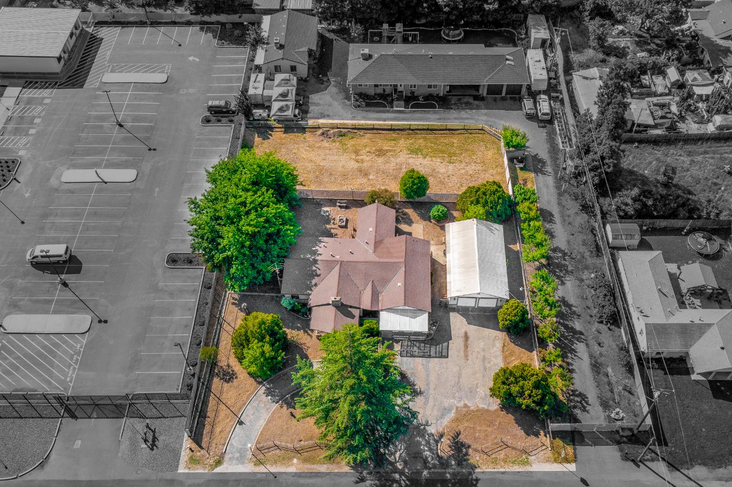 13230 4th Street Hickman, CA 95323 - Photo 10 of 54 an aerial view of residential houses with swimming pool and outdoor space