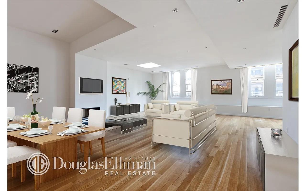 105 Franklin Street, Unit PH Manhattan, NY 10013 - Photo 2 of 4 a living room with furniture and a table