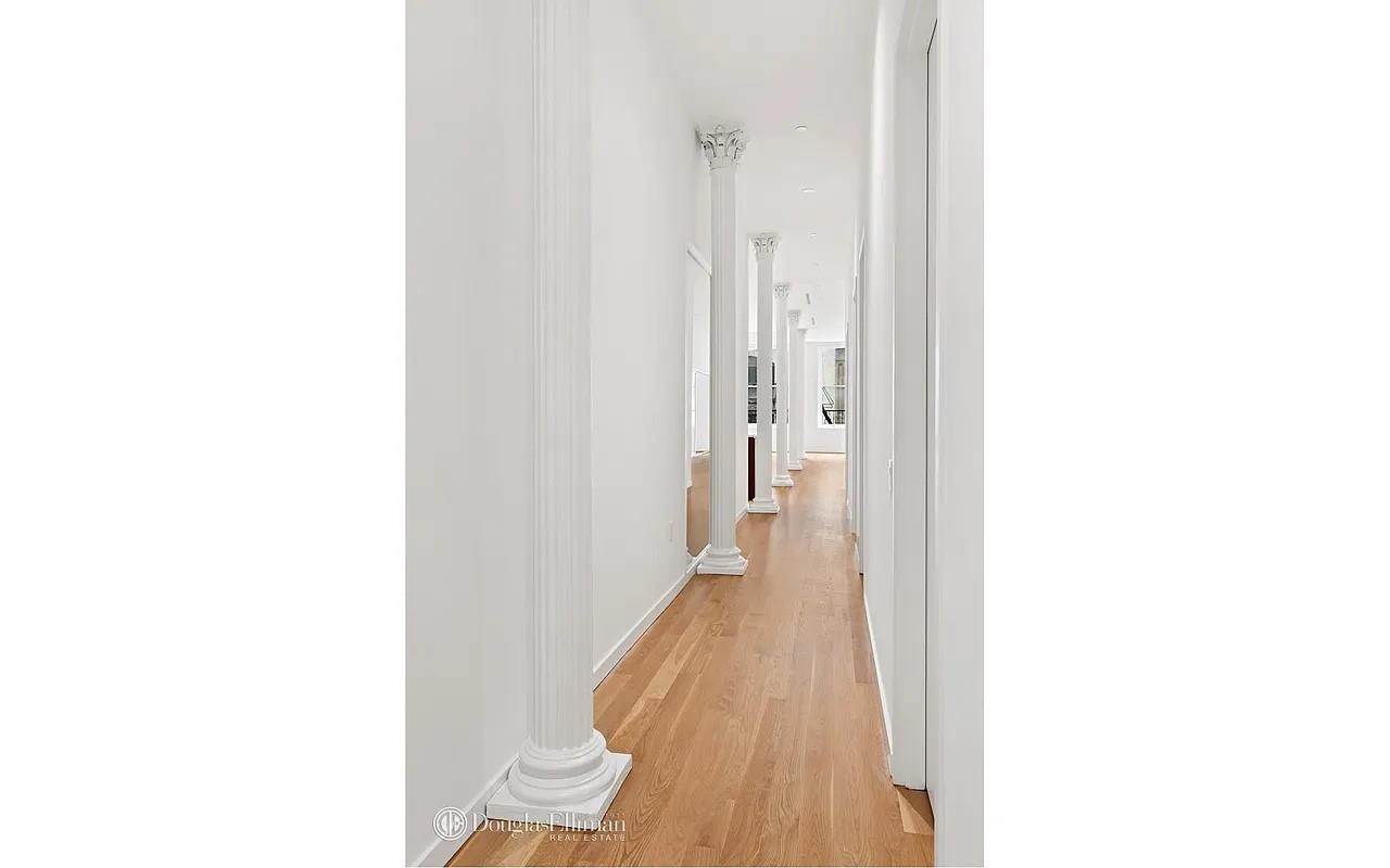 105 Franklin Street, Unit PH Manhattan, NY 10013 - Photo 4 of 4 a view of a hallway with wooden floor
