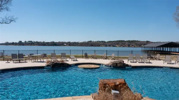 a view of a lake with a big yard