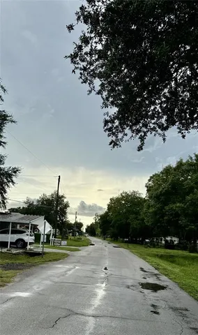 a view of a golf course with a lake