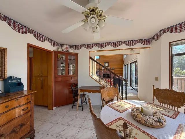 a view of a balcony with wooden floor and outdoor space