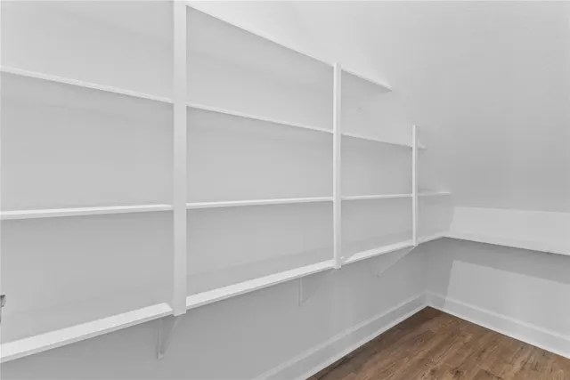 a view of an empty walk in closet