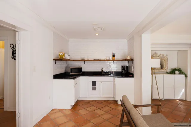 a vase of flowers sitting on a table