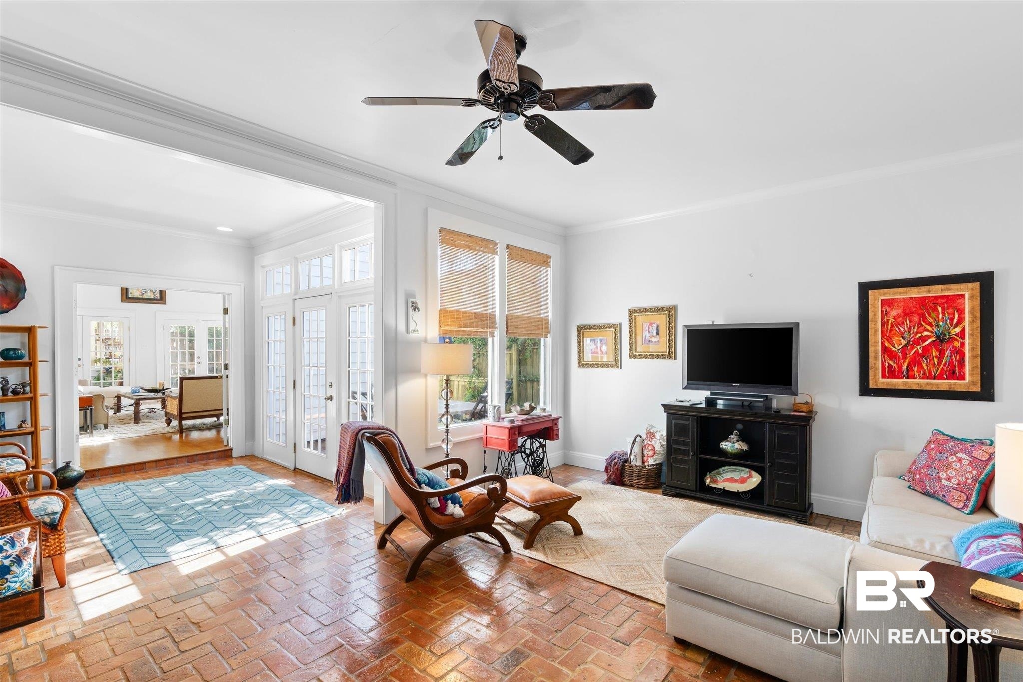 202 Woodlands Avenue Mobile, AL 36607 - Photo 19 of 53 Living room with a wealth of natural light, french doors, crown molding, and ceiling fan