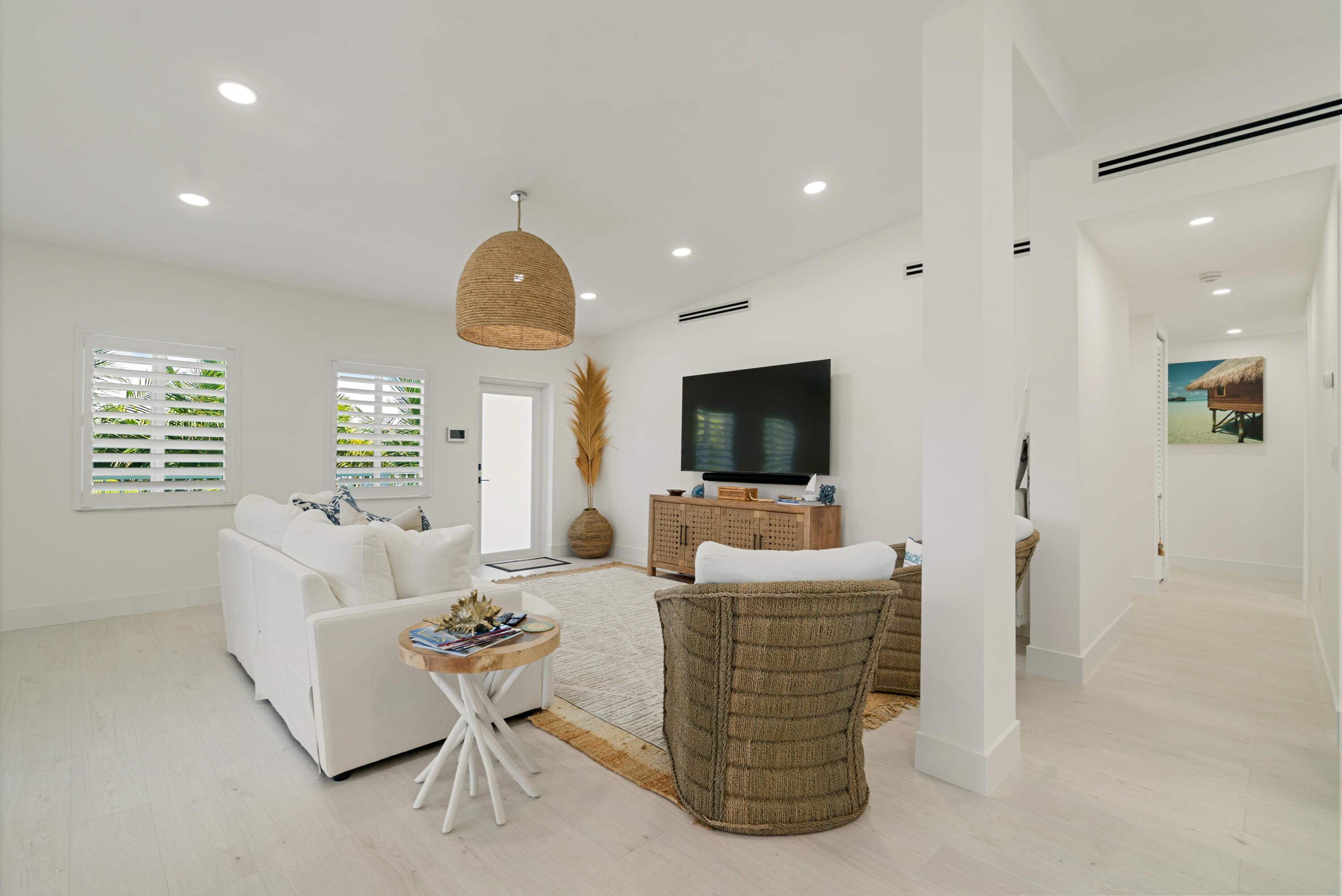 889 Ellen Drive Key Largo, FL 33037 - Photo 12 of 57 a living room with fireplace furniture and a flat screen tv