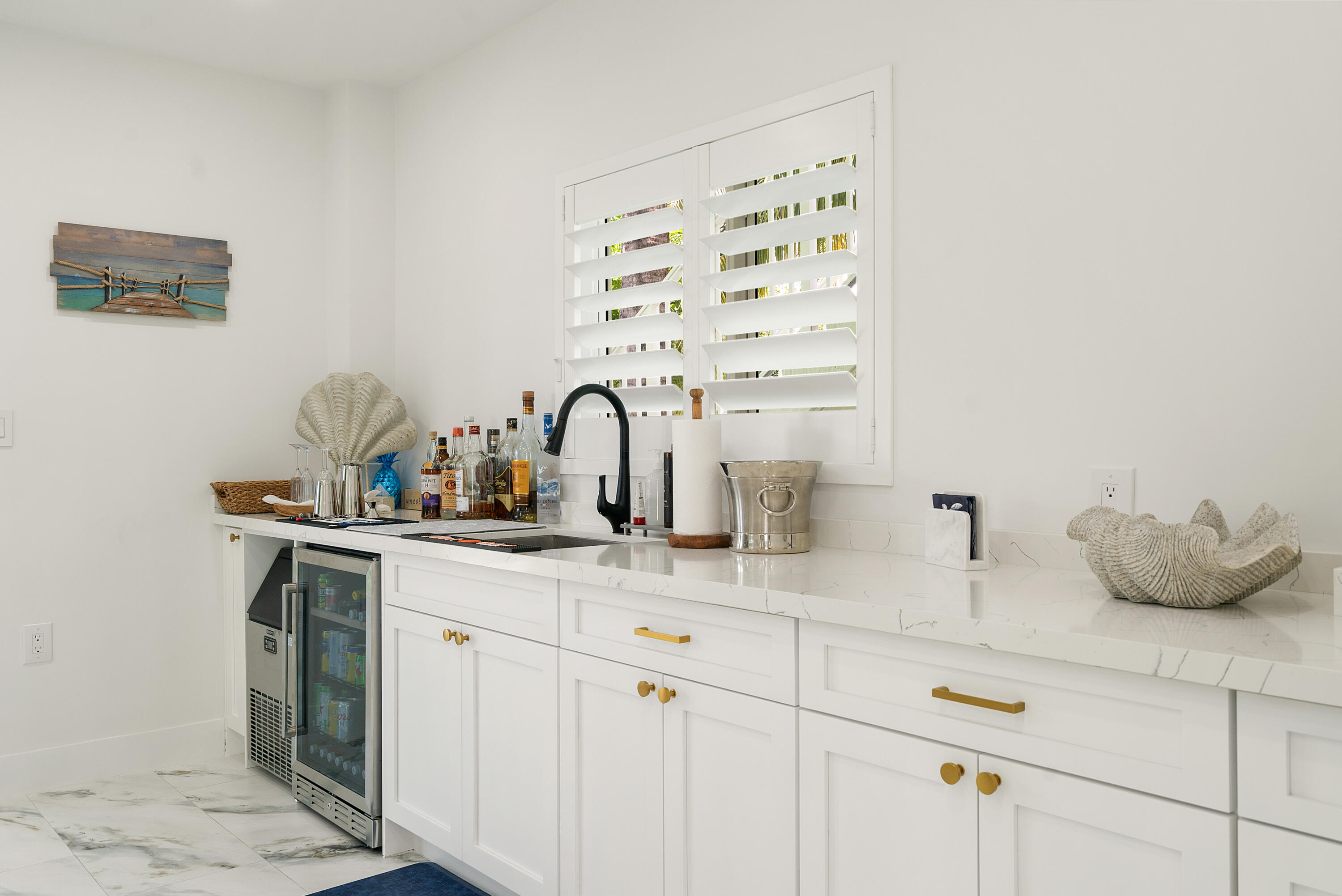 889 Ellen Drive Key Largo, FL 33037 - Photo 21 of 57 a kitchen with a sink and cabinets