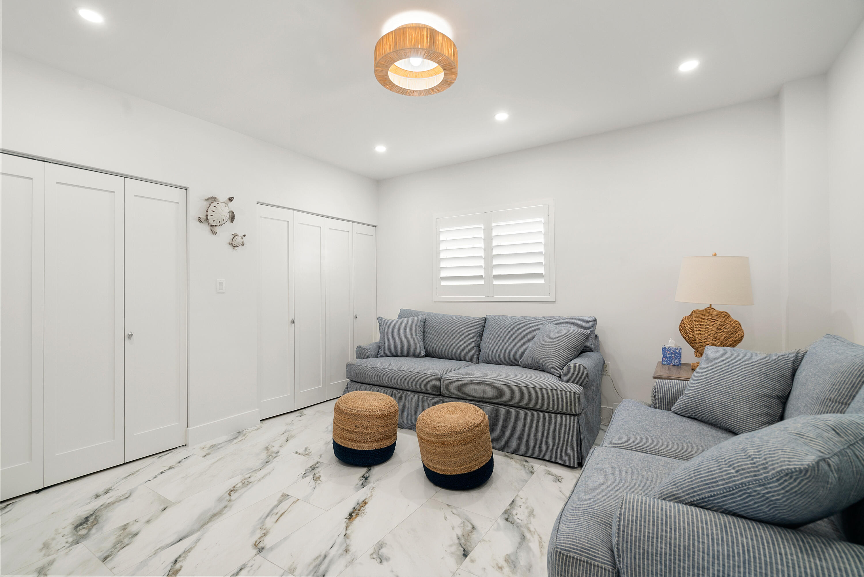 889 Ellen Drive Key Largo, FL 33037 - Photo 23 of 57 a living room with furniture and a window