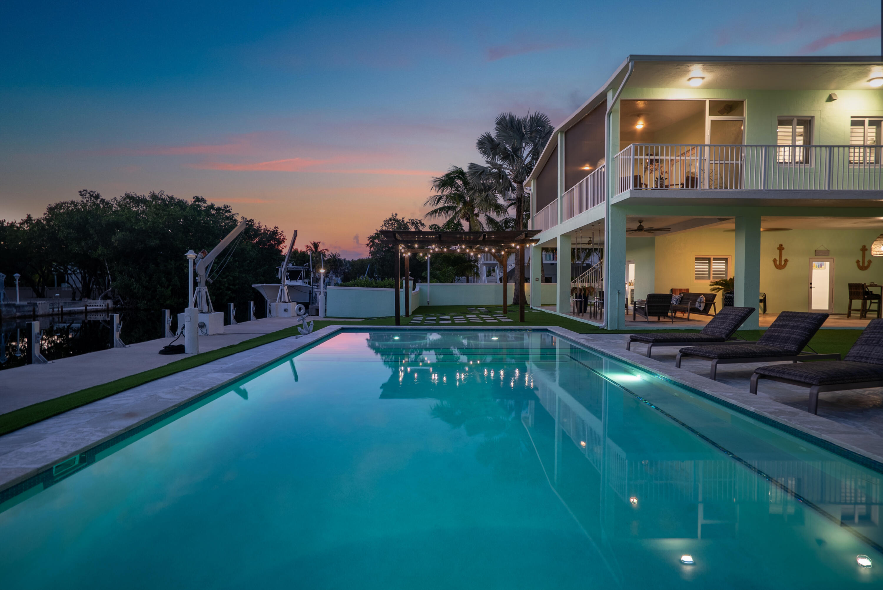 889 Ellen Drive Key Largo, FL 33037 - Photo 28 of 57 a view of an chairs and table in the patio