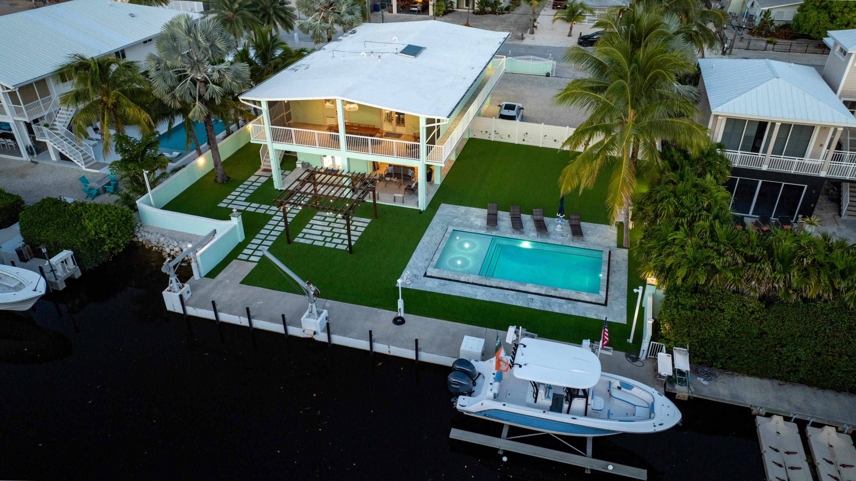 889 Ellen Drive Key Largo, FL 33037 - Photo 35 of 57 an aerial view of a house with table and chairs