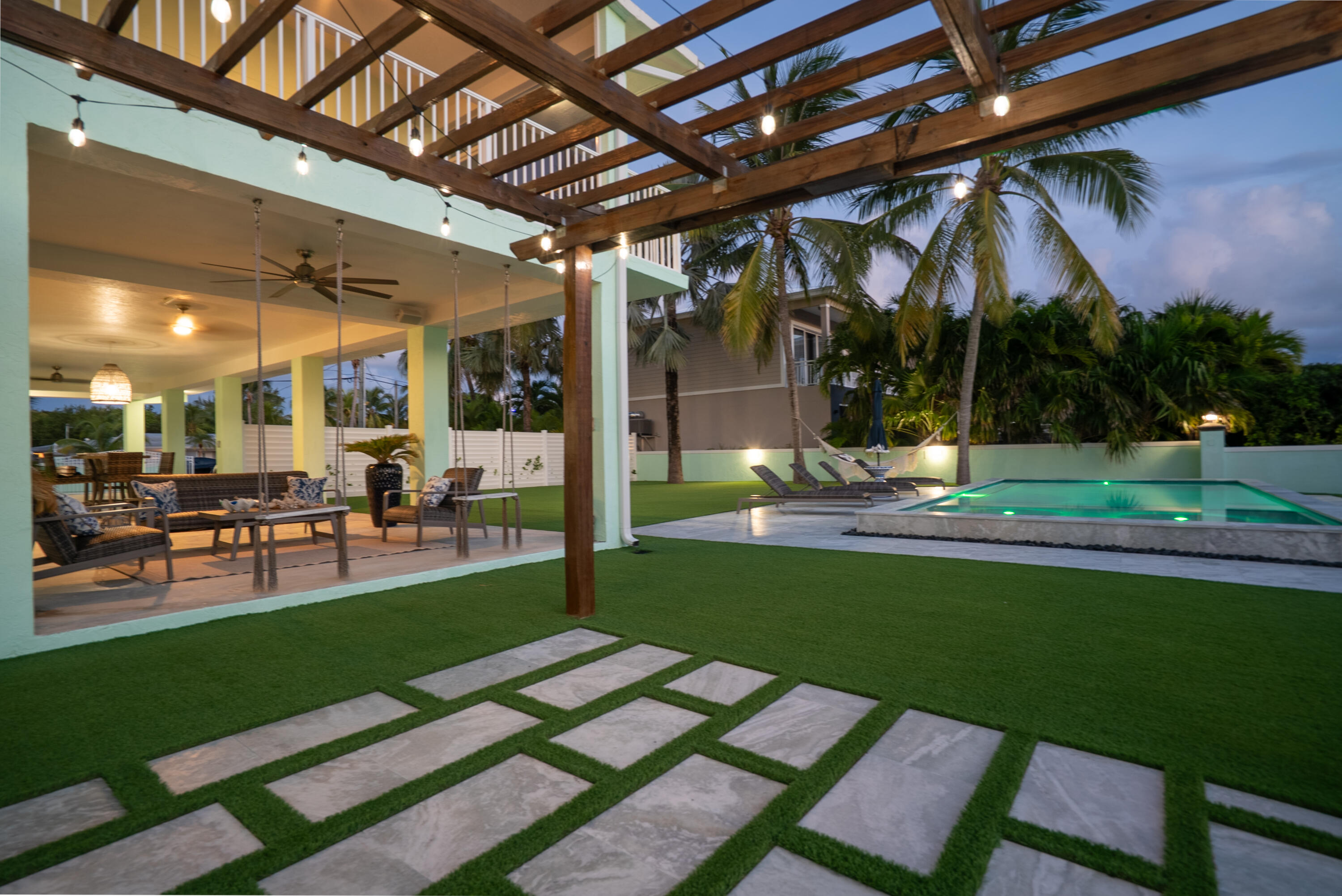 889 Ellen Drive Key Largo, FL 33037 - Photo 42 of 57 a view of a backyard with sitting area