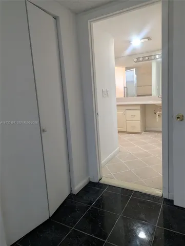 a bathroom with a shower and a toilet