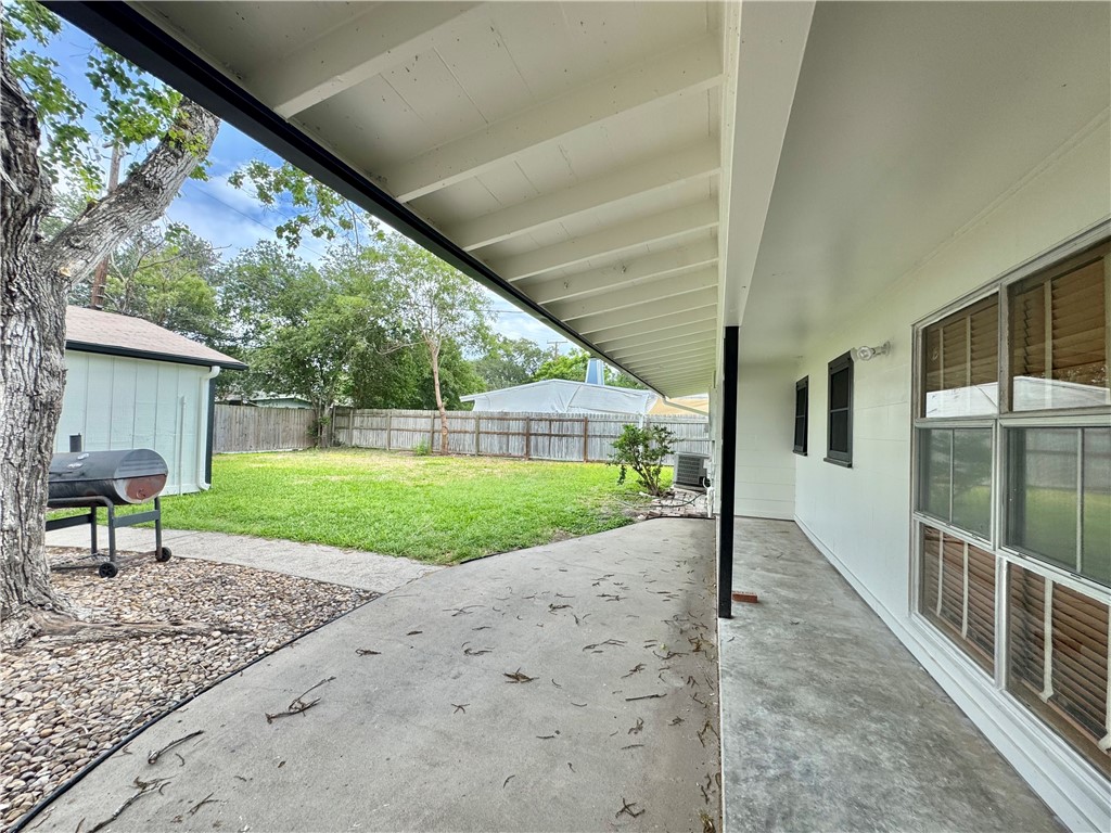 614 Dolphin Place Corpus Christi, TX 78411 - Photo 18 of 23 a view of a house with backyard and a garden