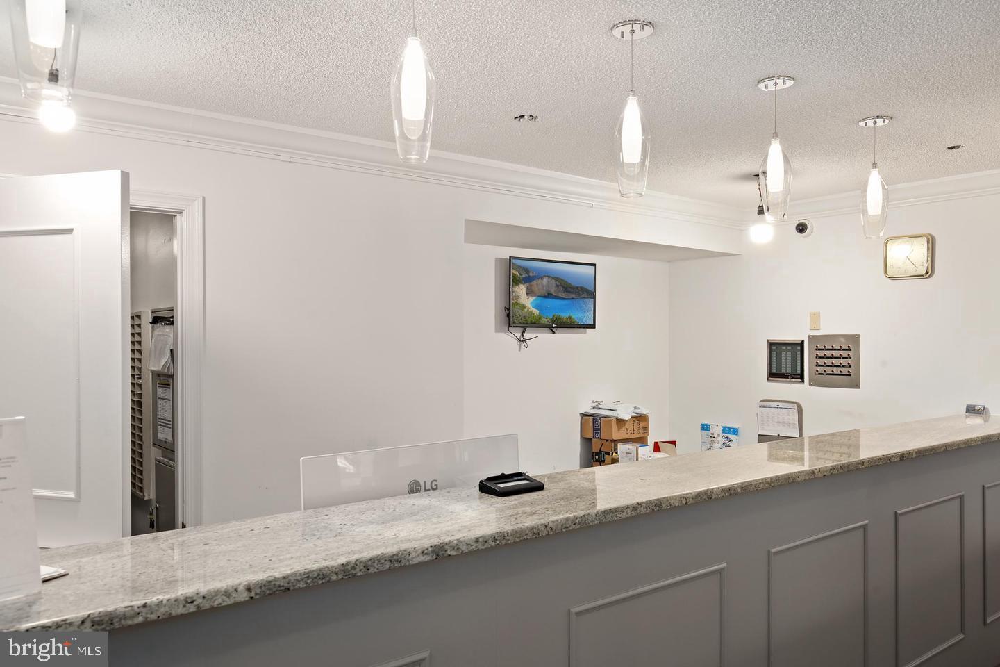 4 Monroe Street, Unit 802 Rockville, MD 20850 - Photo 27 of 44 a bathroom with a sink double vanity granite and a mirror
