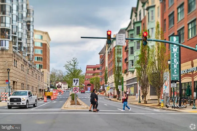 a view of a street with cars