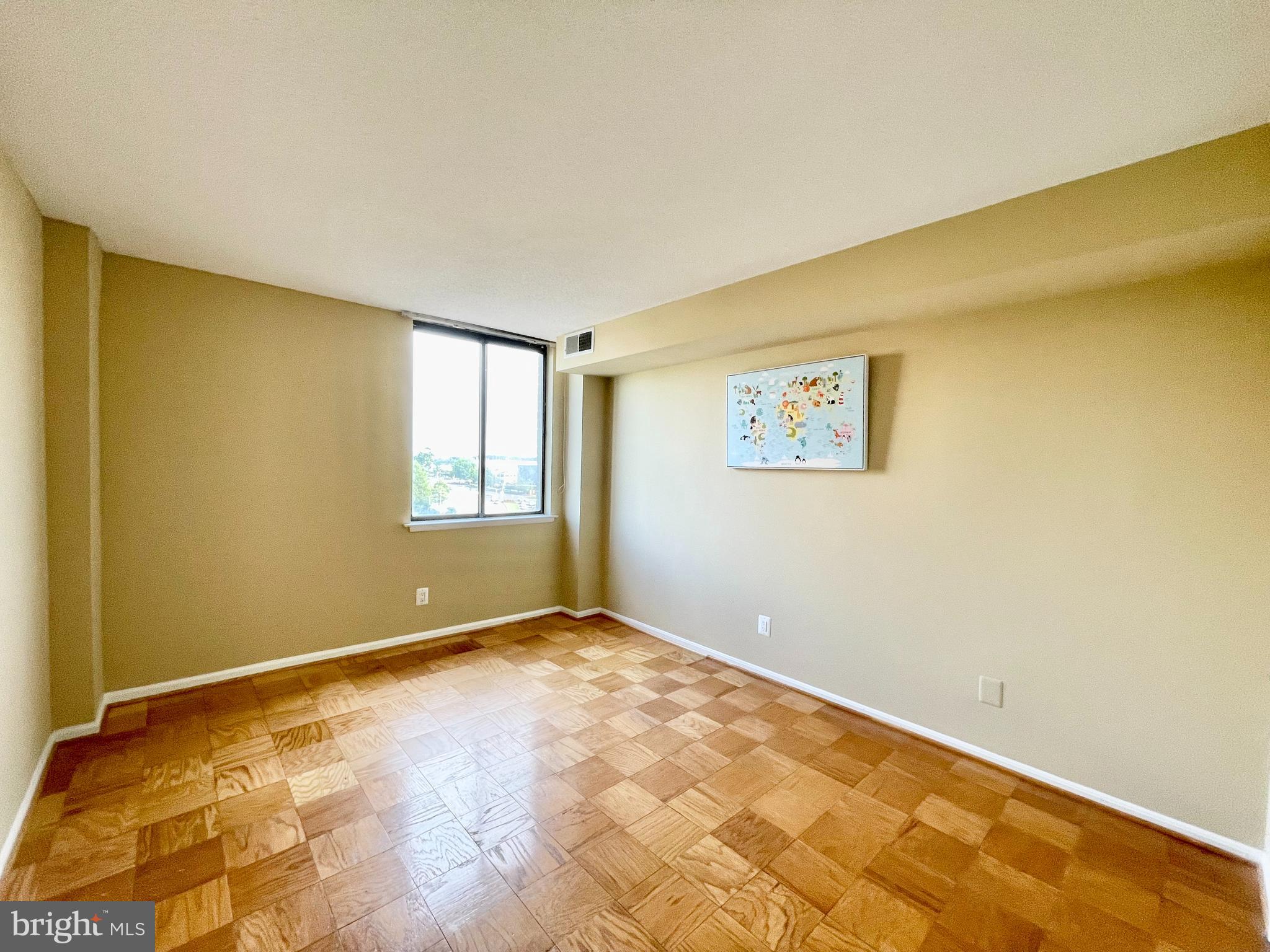 4 Monroe Street, Unit 802 Rockville, MD 20850 - Photo 10 of 44 a view of a big room with windows and closet