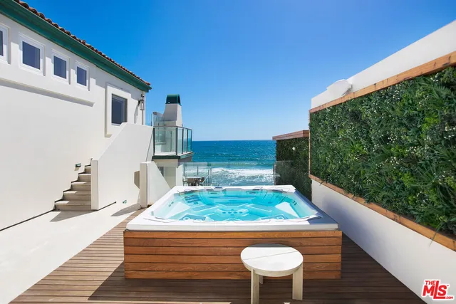 a view of a back yard of the house