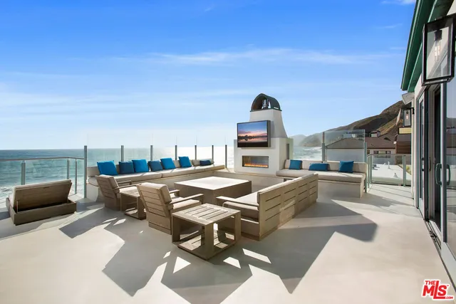 a balcony with furniture