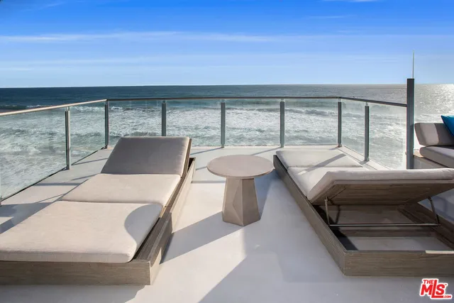 a living room with furniture and a gate