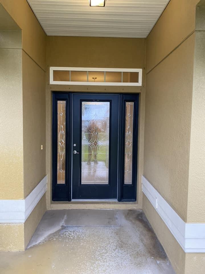 5910 Northwest Java Court Port St. Lucie, FL 34986 - Photo 2 of 16 a view of an entrance door