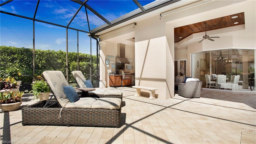645 Rudder Road Naples, FL 34102 - Photo 39 of 45 a balcony view with a couch and table