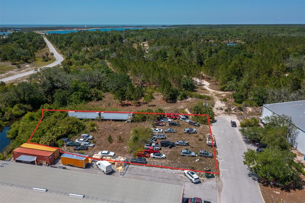 an aerial view of a house with a garden
