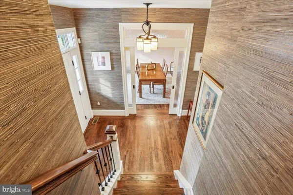 a spacious bathroom with a granite countertop sink mirror and shower