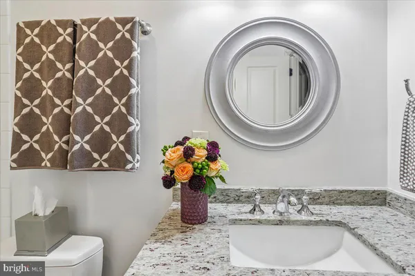 a bathroom with a toilet and a sink