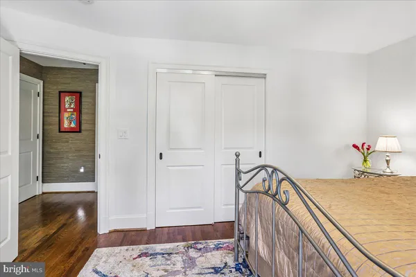 a view of backyard of house with green space