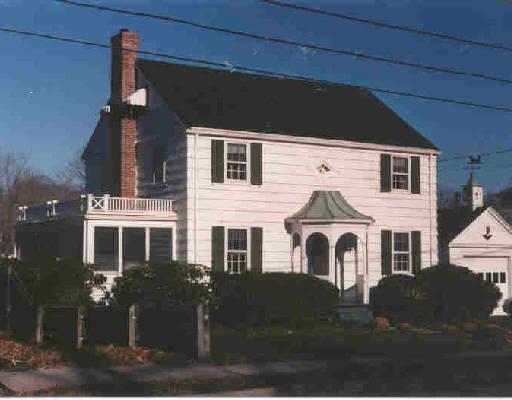 110 Tesiny Circle Bridgeport, CT 06606 - Photo 1 of 1 a front view of a house with yard