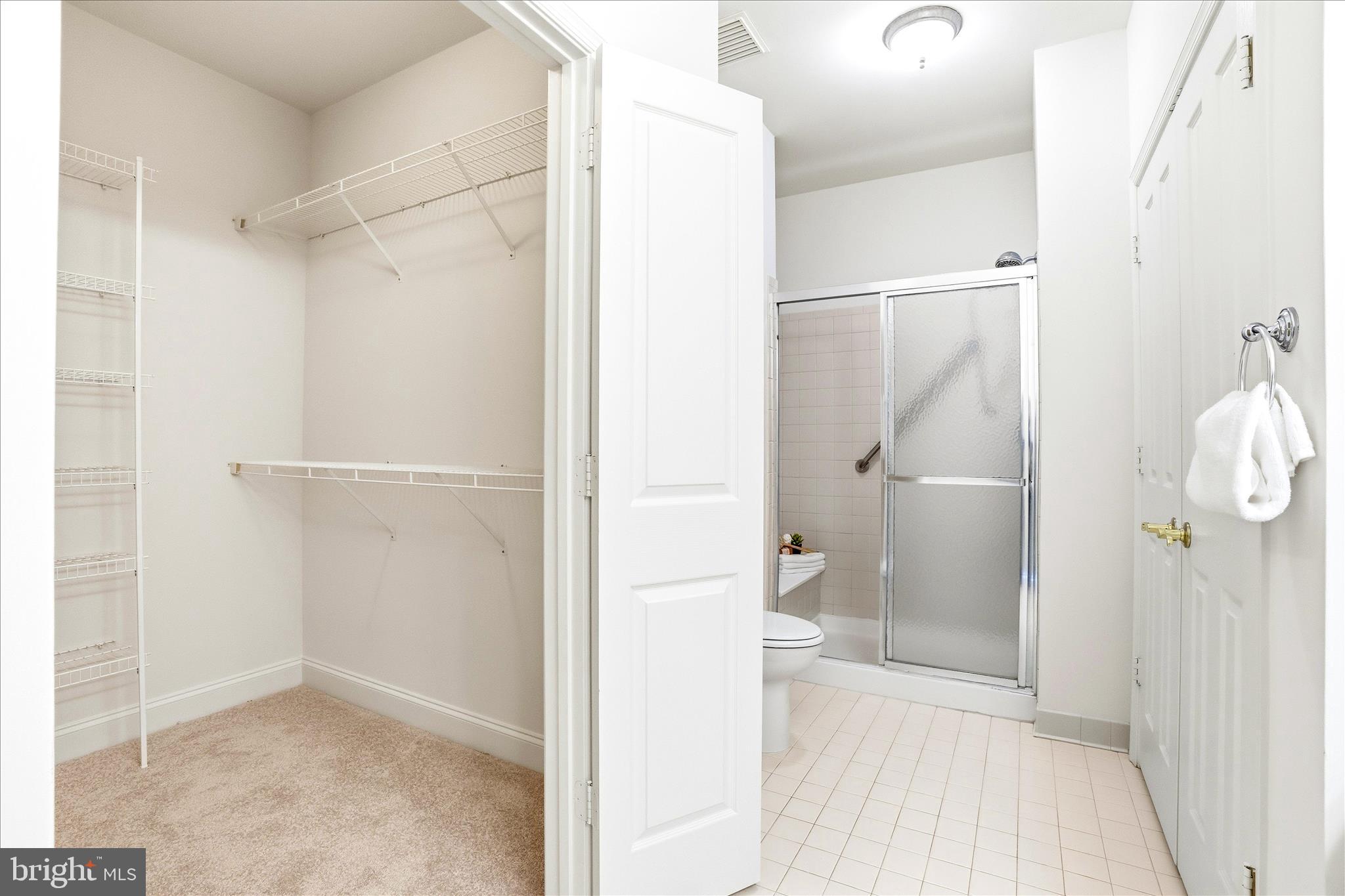 2250 Bear Den Road, Unit 410 Frederick, MD 21701 - Photo 13 of 40 Primary Walk-in Closet/Bathroom