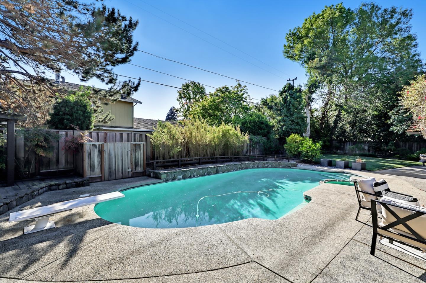 1614 Clay Drive Los Altos, CA 94024 - Photo 35 of 43 a view of backyard with seating space and trees