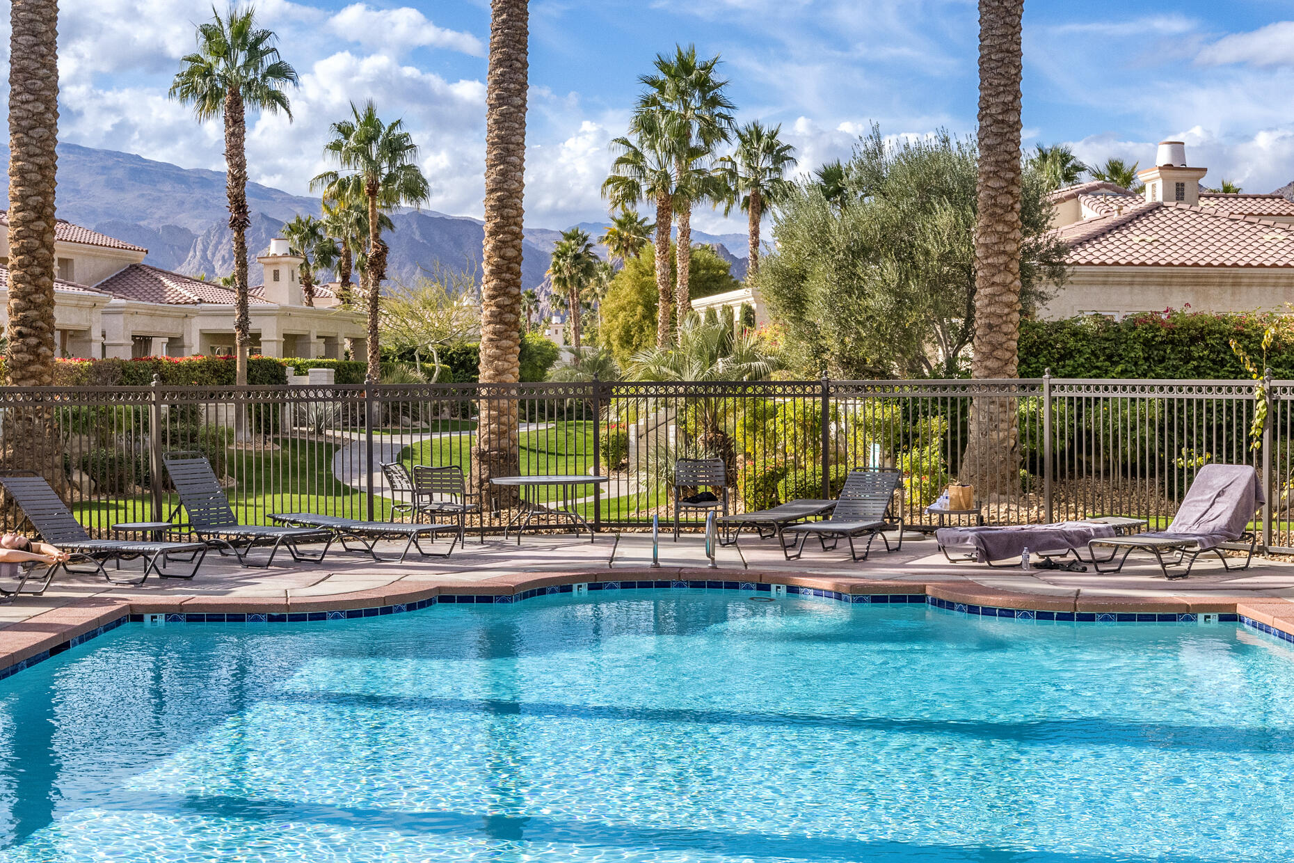 80919 Via Puerta Azul La Quinta, CA 92253 - Photo 26 of 32 a view of a lake with a house