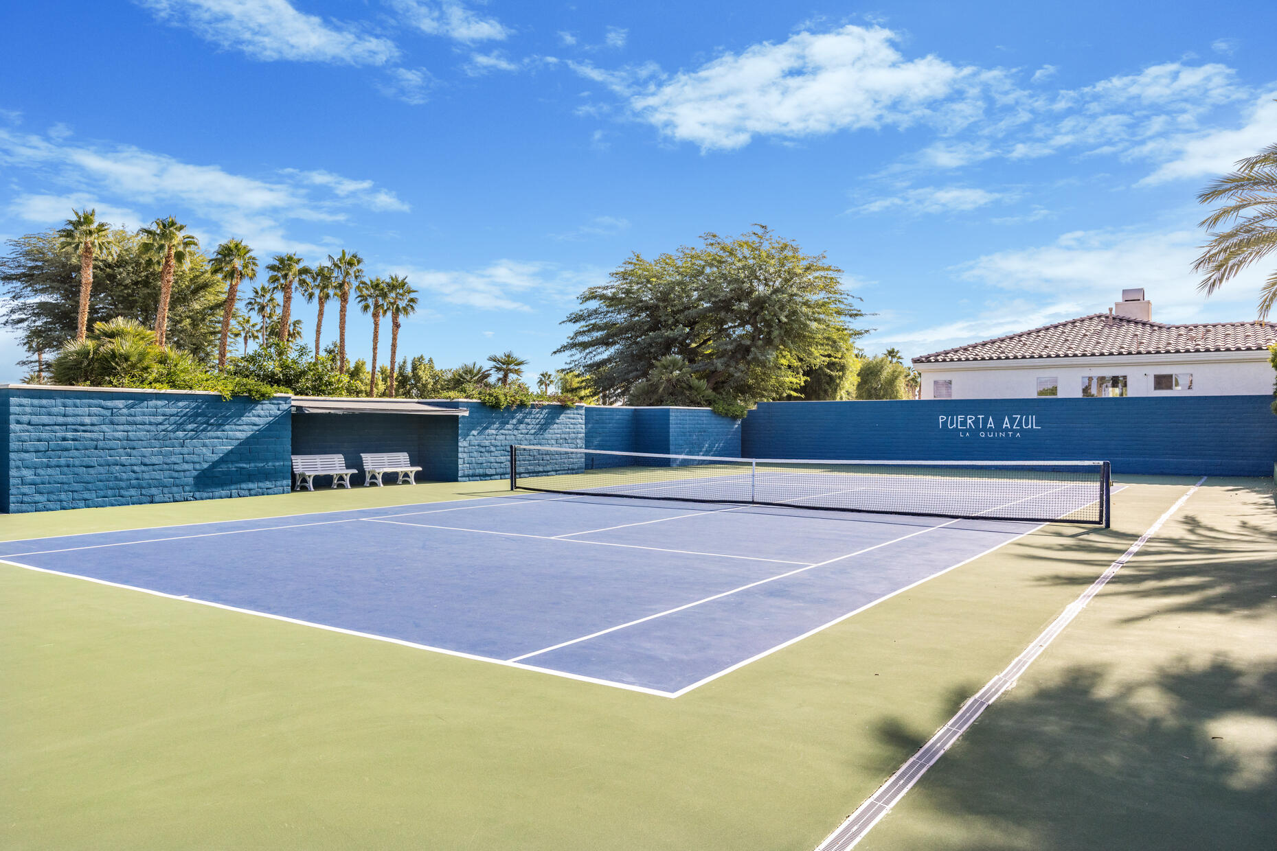 80919 Via Puerta Azul La Quinta, CA 92253 - Photo 27 of 32 a view of a tennis court