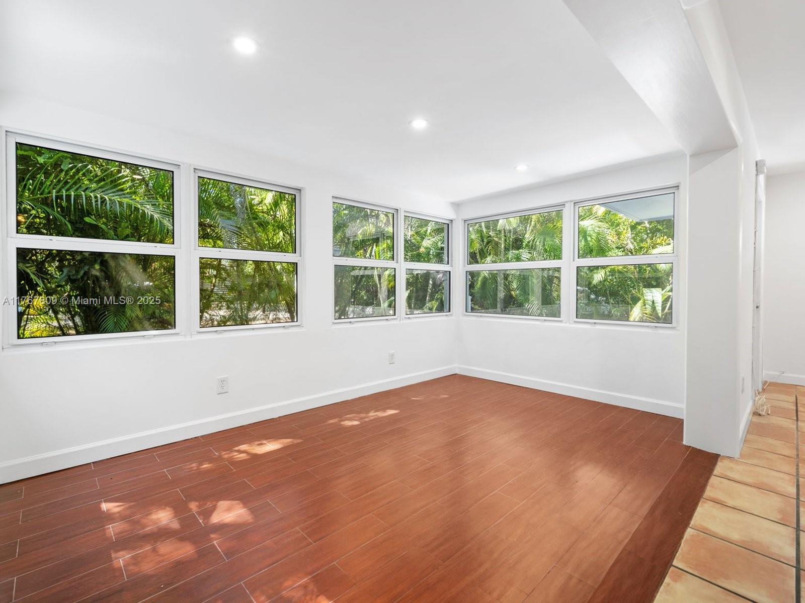 3631 Loquat Avenue Miami, FL 33133 - Photo 11 of 31 a view of an empty room with a window